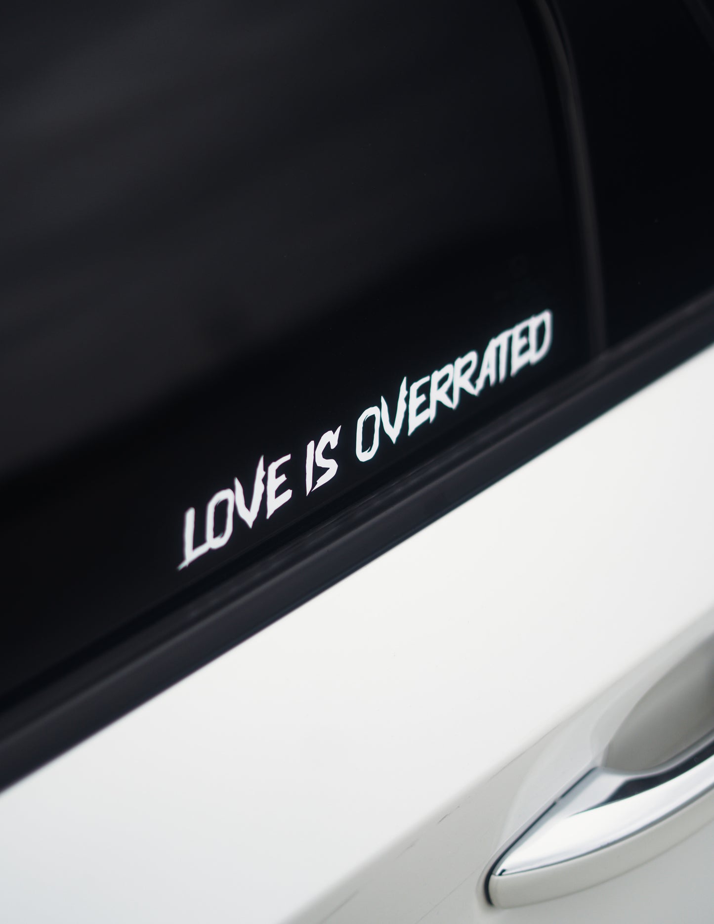 LOVE IS OVERRATED DECAL