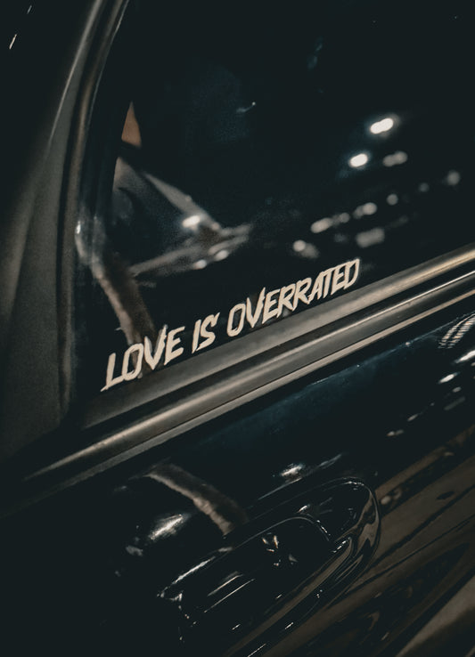 LOVE IS OVERRATED DECAL