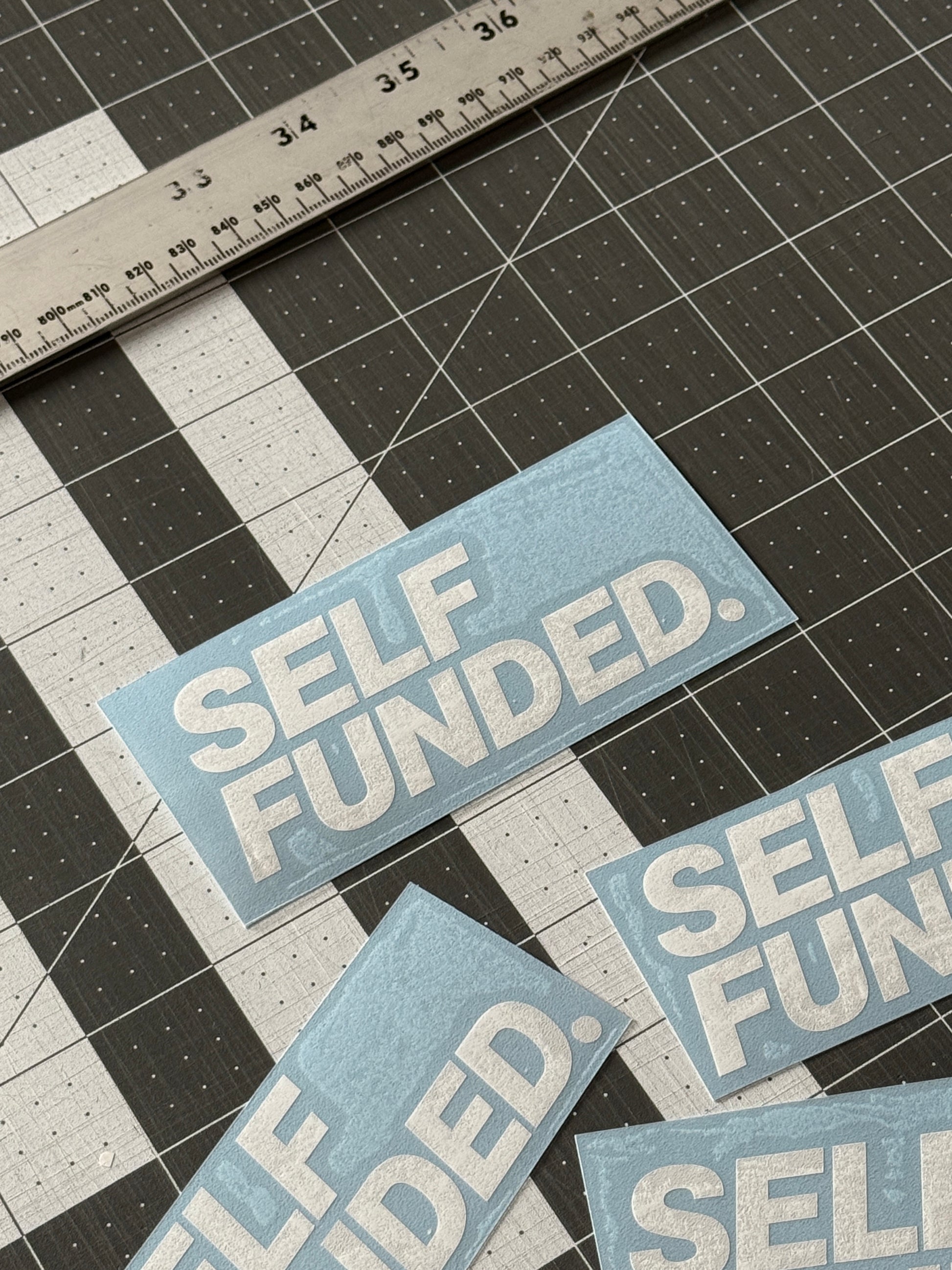 Self Funded decal installed on car window