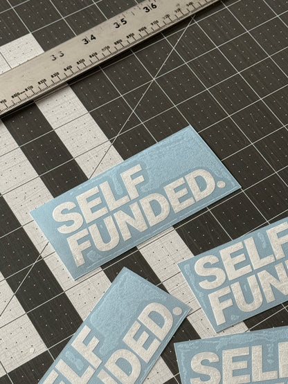 Self Funded decal installed on car window