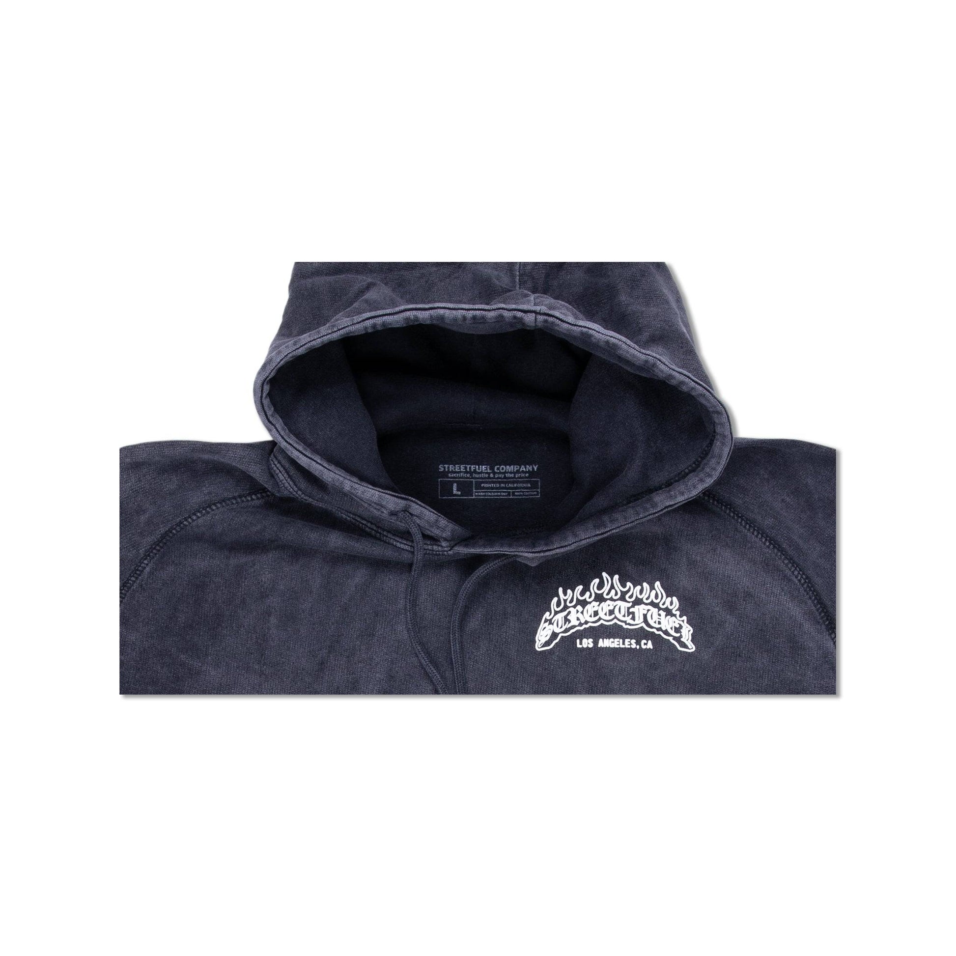 Hood detail of black vintage washed hoodie with streetfuel logo
