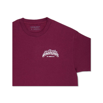 Close-up of maroon tee with Streetfuel logo on front