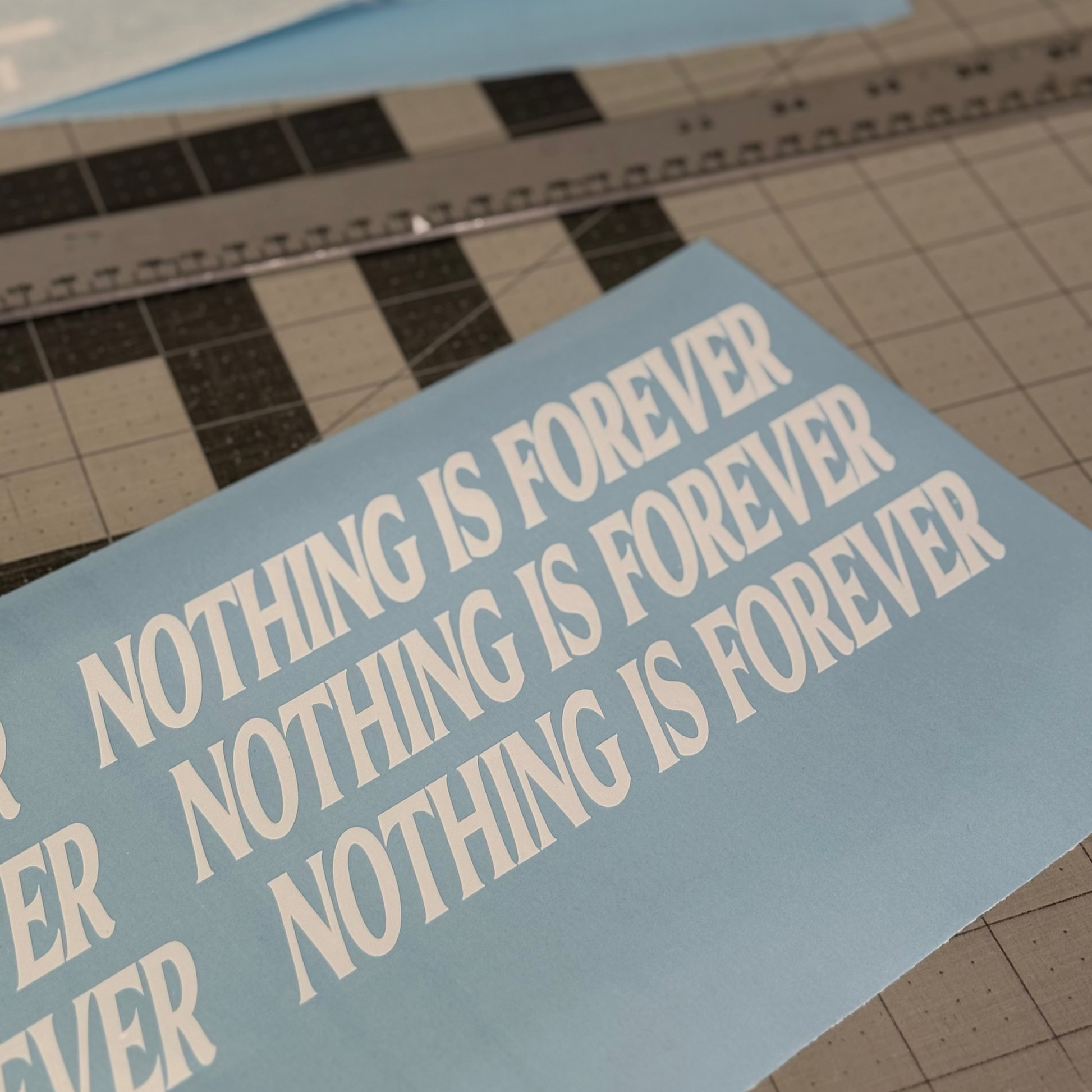 Nothing Is Forever decal on car window