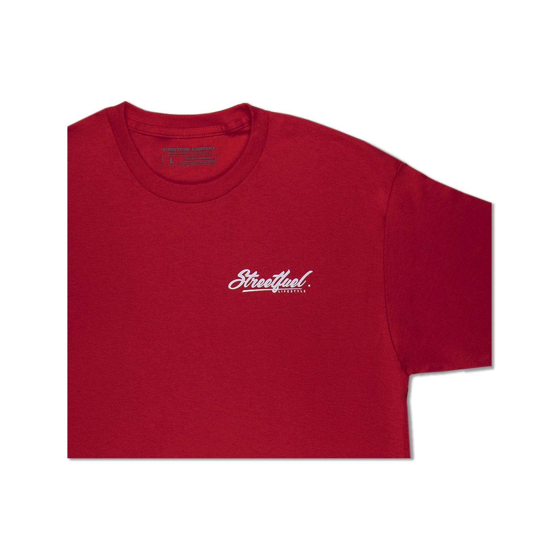 Close-up of red tee front logo print