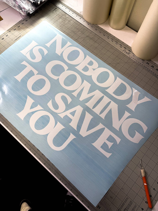 Nobody is coming to save you Banner on table reference
